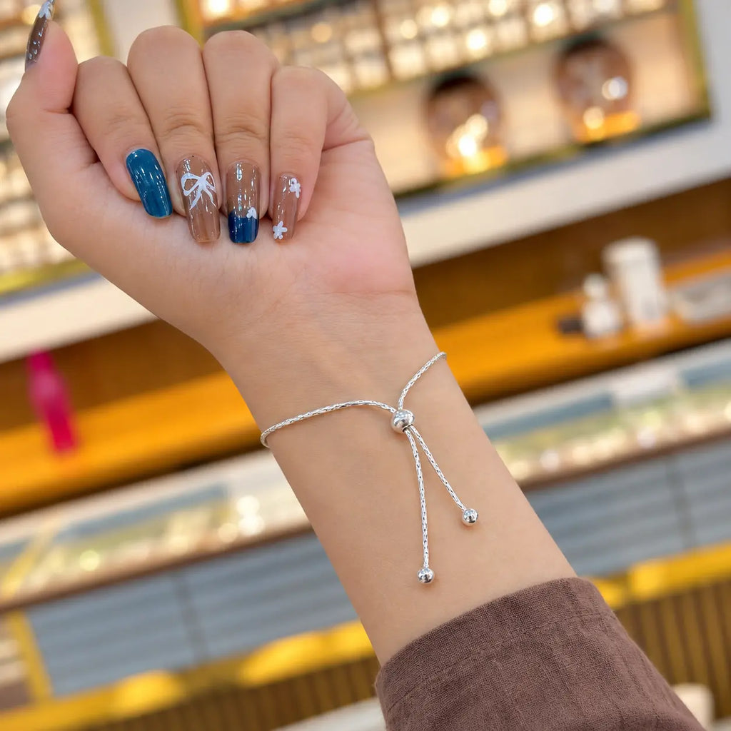 Silver Peacock Feather Bracelet with Trishul